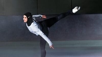 Figure skater Zahra Lari wears Nike's new hijab for Muslim female athletes. The pull-on hijab is made of light, stretchy fabric that includes tiny holes for breathability and an elongated back so it will not come untucked. It will come in three colors: black, vast grey and obsidian. Beaverton-based Nike says the hijab will be available for sale next year. Nike via AP