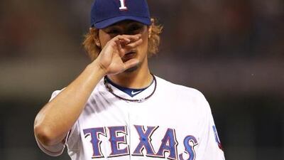 Yu Darvish reacts during the match against the Mariners.