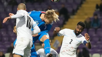 Iceland's Andri Gudjohnsen heads the ball during the Euro 2024 qualifying play-off match. AP