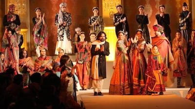 The designer Sabyasachi with his models at the finale of the Peeli Kothi fashion show in New Delhi last year.