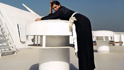 Quarter Deck: Dress Dh2,607 Vatanika at ShopBop; Belt POR SemSem; Shoes Dh3,600, Salvatore Ferragamo; Earrings, Dh1,784, Elisabetta Franchi. 