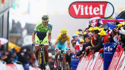 Alberto Contador crosses the line ahead of Vincenzo Nibali at the end of Stage 8. Bryn Lennon / Getty Images