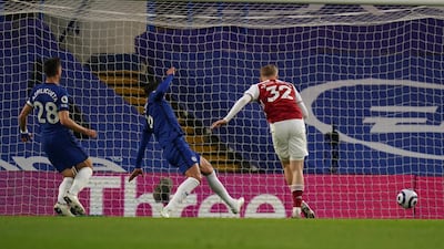 Arsenal's Emile Smith Rowe scores the opening goal. Reuters