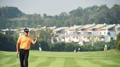 Bubba Watson sinks a putt at the first round of the Shenzen International on Thursday in China. Stuart Franklin / Getty Images / April 16, 2015