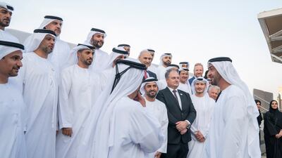 Sheikh Mohamed bin Zayed speaks with employees of the the Abu Dhabi Airport Company, during a Sea Palace barza. Mohamed Al Hammadi / Ministry of Presidential Affairs