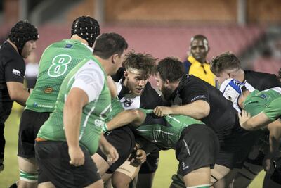 Dubai Sports City Eagles, in green, hope to build on their experience. Reem Mohammed / The National