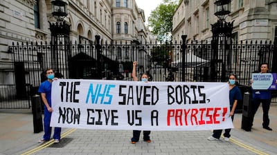 NHS staff lobby UK Prime Minister Boris Johnson for a pay rise. AFP