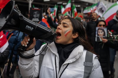 A person shouts into a loudspeaker during a 'Freedom for Iran' protest in New York. EPA
