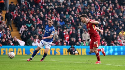 Liverpool's Diogo Jota scores his team's first goal. Reuters