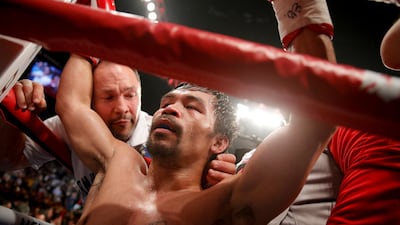 Manny Pacquiao celebrates his win against Adrien Broner. AP Photo