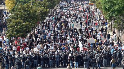 Security forces including Lebanese Army units block a protesters' march during a mass demonstration against the Lebanese government and worsening economic conditions, a road near the Mohammad Al-Amin Mosque, in Beirut, Lebanon. EPA