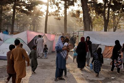 Displaced Afghan families at a makeshift shelter at Shahr-e Naw park, in Kabul, Afghanistan. Reuters.