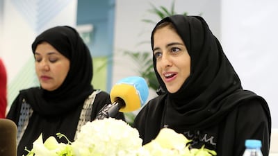 Najla Al Awar, Minister of Community Development, right, and Sana Suhail, undersecretary of the Ministry explain at the Rehabilitation and Care Centre for People of Determination in Dubai how the new national policy will provide more job opportunities for people with special needs. Pawan Singh / The National