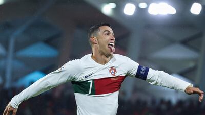 Portugal forward Cristiano Ronaldo celebrates after scoring his team's first goal. AFP