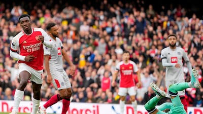 Arsenal's Eddie Nketiah, left, celebrates scoring his side's opener. AP