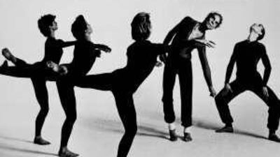 In a August 18,1986 file photo, choreographer Merce Cunningham, second from right, performs in a piece titled Quartet with his dance company