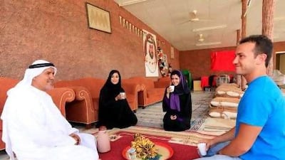 Italian Michele Ceci, right, was so impressed with a homestay experience in Masafi that he decided to move to the UAE.