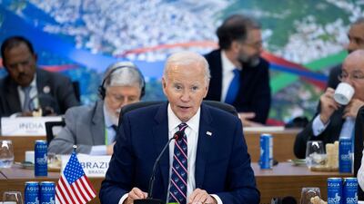 President Joe Biden at the G20 Summit in Rio de Janeiro, Brazil. Mr Biden's pledge is part of his efforts to future-proof alliances and his climate legacy. AP