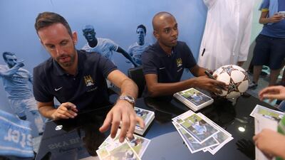 Brazilian midfielder Fernandinho and English goalkeeper Richard Wright were at the City Store in Abu Dhabi’s Marina Mall for an autograph session. Sammy Dallal / The National