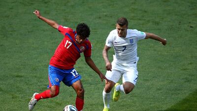 Yeltsin Tejeda of Costa Rica controls the ball against Jack Wilshere of England during their match on Tuesday at the 2014 World Cup in Belo Horizonte, Brazil. Jeff Gross / Getty Images
