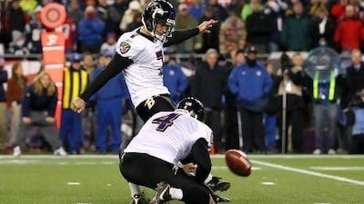 The Baltimore Ravens's Billy Cundiff, back, missed the chance to tie the AFC Championship Game late on against the Patriots.