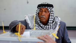 A man votes during the municipal council election in Birzeit near Ramallah, in the Israeli-occupied West Bank. Reuters.