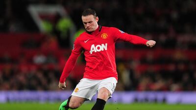 Wayne Rooney of Manchester United in action during the Premier League match between Manchester United and West Ham United at Old Trafford on December 21, 2013. Stu Forster / Getty Images