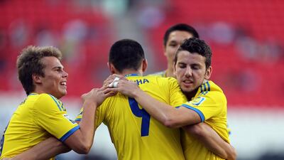 Sweden's man of the match, Valmir Berisha, centre, celebrates with teammates after scoring a goal one of this three goals in their win over Argentina to secure the bronze at the Fifa Under 17 World Cup in Abu Dhabi. Sammy Dallal / The National