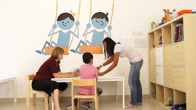 A study by the Ministry of Community Development has recommended training parents of children with disabilities on the basics of distance learning. Pawan Singh / The National