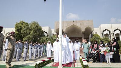Emirati elders and toddlers come together to plant a tree and raise the UAE flag for Flag Day in Fujairah. Wam