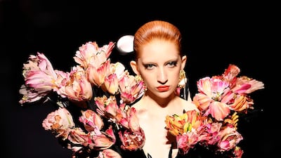 A sassy lip and a sweep of eyeshadow at Schiaparelli. AFP