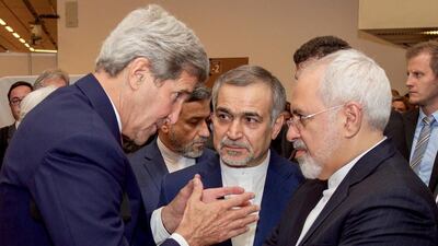 US secretary of state John Kerry speaks with Iranian foreign minister Javad Zarif. Reuters