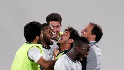 Al Sadd players are in full celebration after winning the penalty shoot-out that sent them through to the AFC Champions League group stages. Christopher Pike / The National