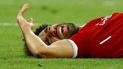 Mohamed Salah will take up to four weeks to recover from a shoulder injury picked up in the Champions League final loss to Real Madrid on May 26, according to Liverpool's physio. Kai Pfaffenbach / Reuters