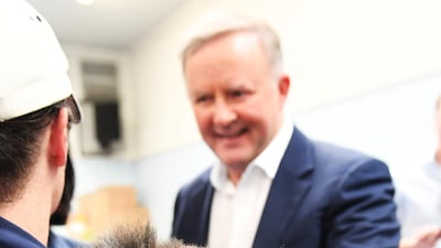 Rescued orphaned baby koala Jack clings to Jane Barister the director of Adelaide Koala Rescue as Labour Leader Anthony Albanese moves in for a hold of him .The Adelaide Koala Rescue which has been set up in the gymnasium at Paradise Primary School in Adelaide in Adelaide, Australia. Getty Images