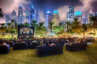Urban Outdoor Cinema at Habtoor Grand, framed by the skyline of Dubai Marina. Courtesy Urban Outdoor Entertainment.