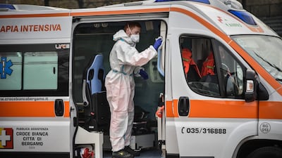 An ambulance that transports Covid-19 patients to the Monza circuit is disinfected. EPA