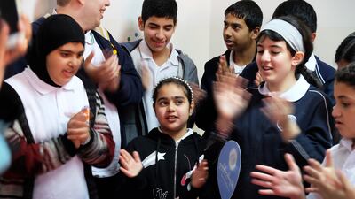 Birthday celebrations with a cake by the Celebrate Life bakery at the Gulf Autism Centre in Abu Dhabi. Delores Johnson / The National