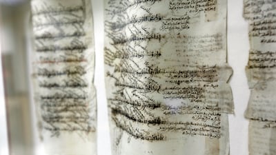 An old Arabic script in a collection at the Juma Al Majid Centre and Heritage in Dubai. Satish Kumar / The National