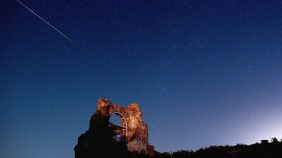 A long exposure image showing a meteor over the early Byzantine Christian basilica ‘Red Church’ near the town of Perushtitsa, some 120 kilometers from Sofia, Bulgaria. Vassil Donev / EPA