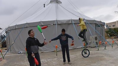 Jareer Taha, 14, juggles with clubs. More than 300 Palestinian children from across the West Bank coming to the school to learn circus performance skills each week.