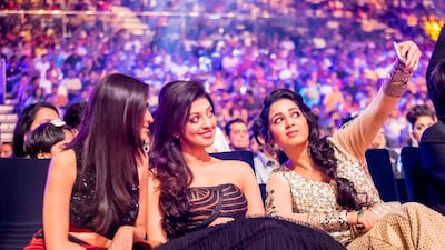 Actresses Kriti Kharbanda, Praneetha Subhash and Charmme Kaur taking a selfie at 2015 SIIMA awards held in Dubai. Courtesy Siima