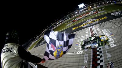 Kevin Harvick, of the Stewart-Haas Racing team, crosses the finish line to win the Monster Energy Nascar Cup Series AAA Texas 500 on Sunday, November 3. AFP
