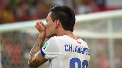 Chile's Charles Aranguiz celebrates scoring against Spain on Wednesday in their 2014 World Cup Group B match at the Maracana in Rio de Janeiro, Brazil. Christophe Simon / AFP