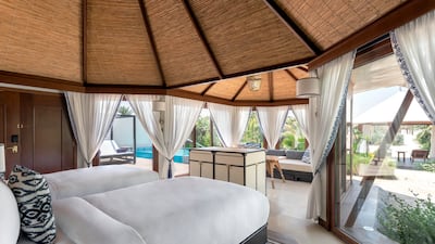 The 32 villas in the boutique resort have a thatched roof effect
