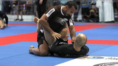 The UAE’s Mohammed Al Qubaisi, top, defeated Jose Ribamar Junior of Brazil in the 76-kilogram class before losing to countryman Taleb Saleh Al Kirbi in the gold medal match.Jeffrey E Biteng / The National