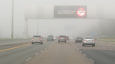 Drivers contend with foggy conditions in Abu Dhabi. Victor Besa / The National