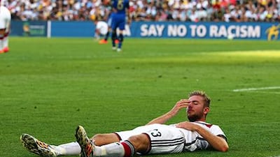 Germany's Christoph Kramer lies on the pitch during the Fifa World Cup 2014 final between Germany and Argentina at the Estadio do Maracana in Rio de Janeiro. Diego Azubel / EPA