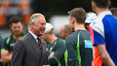 Prince Charles meets with an Australia cricket player on Wednesday ahead of the 2015 Ashes series. Stu Forster / Getty Images