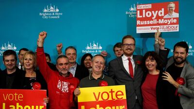 Labour Party candidate Lloyd Russell-Moyle celebrates with supporters after he is announced as the winner for the constituency of Brighton Kemptown at a counting centre for Britain's general election in Brighton, Britain. Reuters